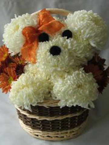 flower arrangement shaped like a dog